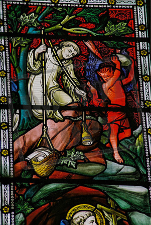 St Benedict's window - Benedict's friend Romanus lowering food to the cave where Benedict lived, while the devil prepares to throw a stone at the warning bell