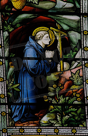 St Benedict's window: detail showing Benedict as a hermit at prayer