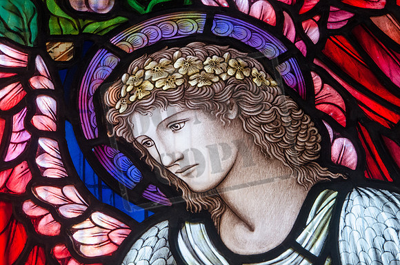 Head of the Angel of Mercy - one of three figures by Morris and Co., 1912, in the East window of the church of St Katharine, Wormington, Gloucestershire
