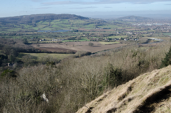 Witcombe Reservoir and Robins Wood Hill in the right background beyond, from Crickley Hill