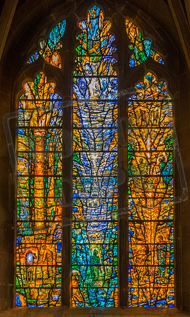 Tewkesbury Abbey: Tom Denny's 2002 windows in St Catherine and St John's Chapel - the theme is gathered into a sequence of questions and answers from John 6.